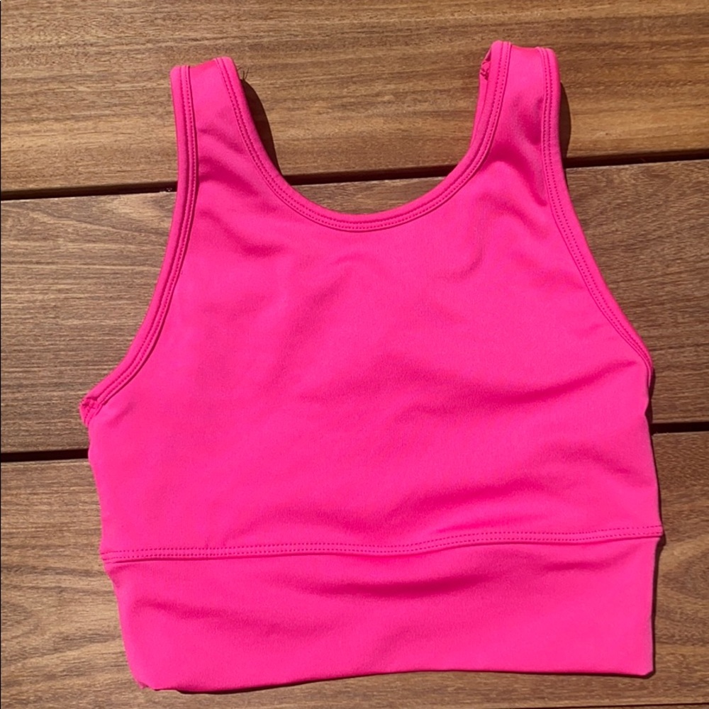 Bright pink athletic crop top